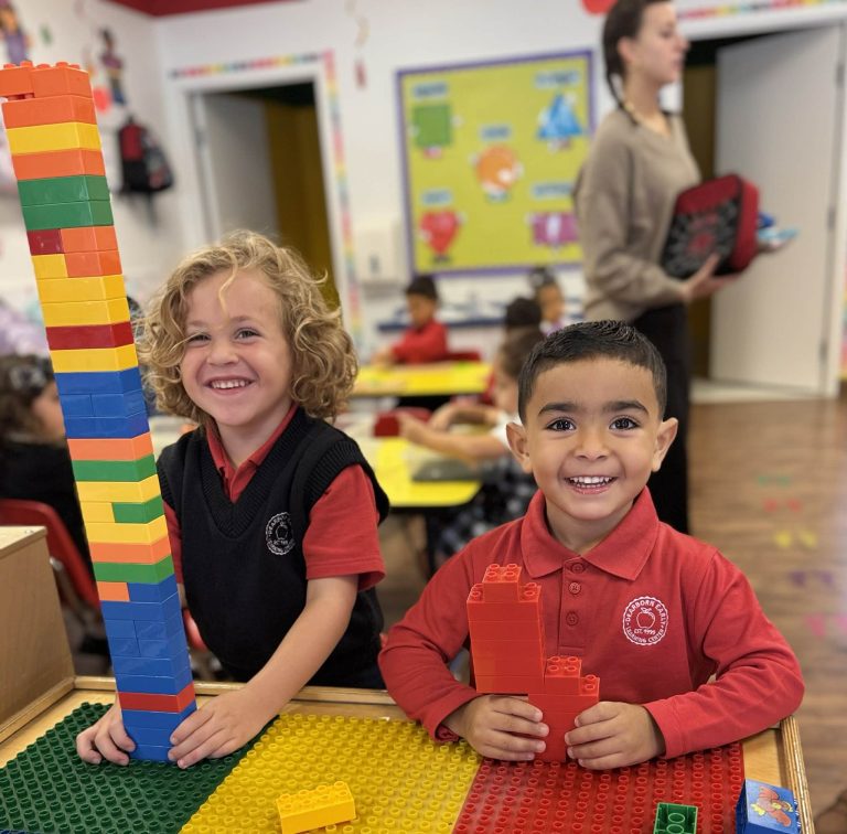 boys building tower preschool